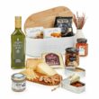 Cesta regalo gourmet sin alcohol en panera con queso ibérico, AOVE y conservas
