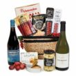 Cesta regalo de Navidad en cesto de esparto con ibéricos de bellota, Rioja y turrón